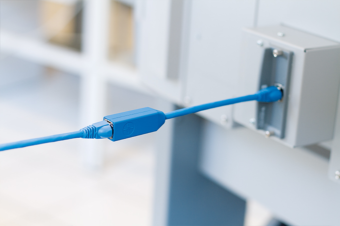 RJ45 patch cable and adapter with tensile load